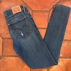 Levi’s mid rise ripped jeans
